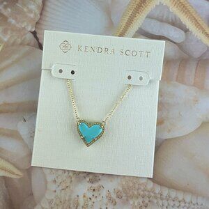 Kendra Scott Ari Heart light blue magnesite gold necklace.